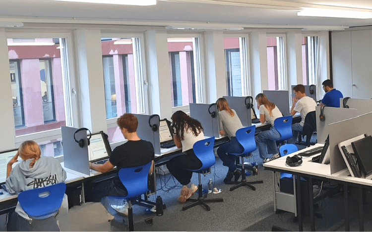 Students taking the new Linguaskill Business exam I Swiss Exams 
