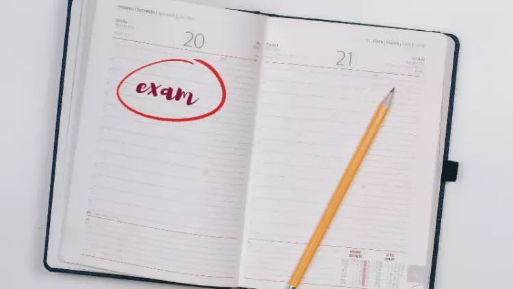 Diary with pen for planning your Cambridge exams
