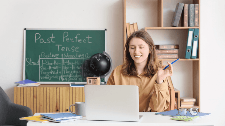 English student in the room with laptop